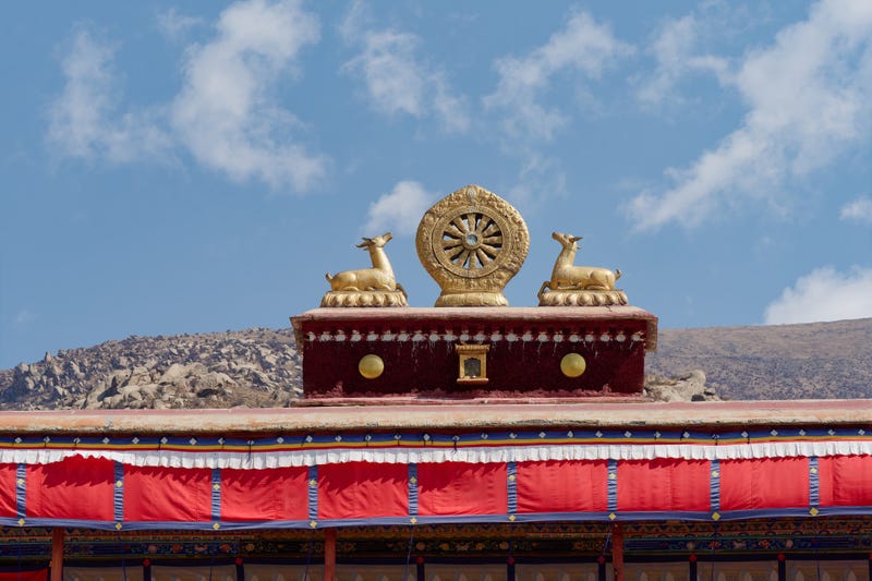 A view of the two two golden deer flanking a Dharma wheel at Drepung Monastery located at the foot of Mount Gephel near Lhasa, Tibet. Minnesota is home to a significant population of Tibetans.