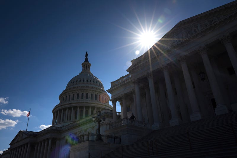 The sun sets behind the U.S. Capitol on Sept. 10, 2024, in Washington, DC.