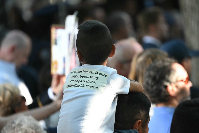 People attend a remembrance ceremony on the 23rd anniversary of the September 11 terror attacks
