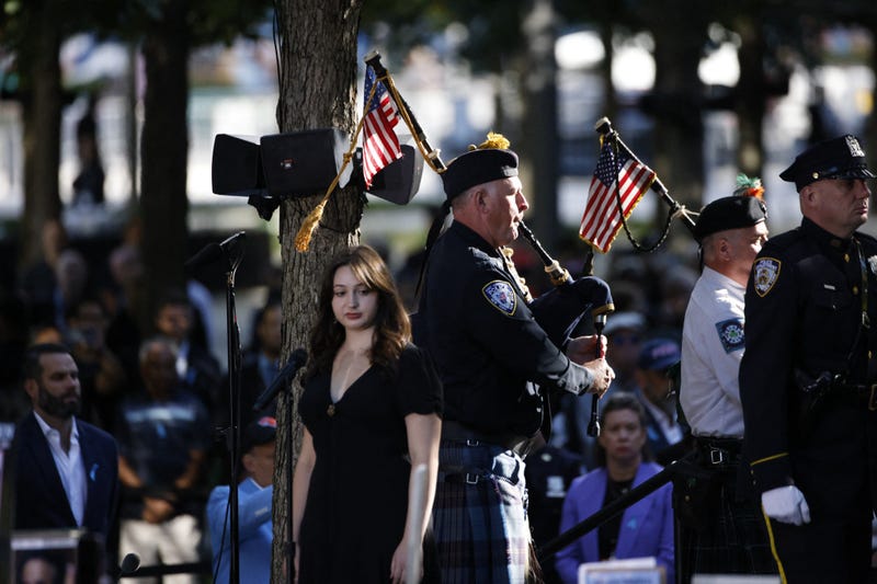 The names of the victims of the 9/11 terror attack are read during a remembrance ceremony on the 23rd anniversary of the September 11 terror attacks