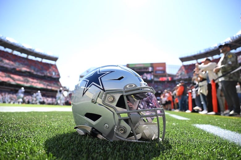 A Dallas Cowboys helmet rests on the field before the game against the Cleveland Browns at Cleveland Browns Stadium on September 08, 2024 in Cleveland, Ohio