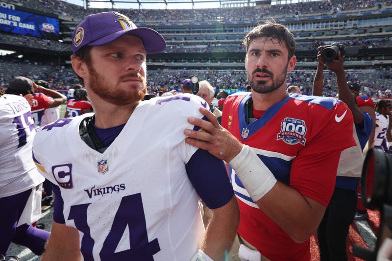 Now they're teammates? Daniel Jones #8 of the New York Giants greets Sam Darnold #14 of the Minnesota Vikings after the game at MetLife Stadium on September 08, 2024 in East Rutherford, New Jersey. The Vikings defeated the Giants 28-6.