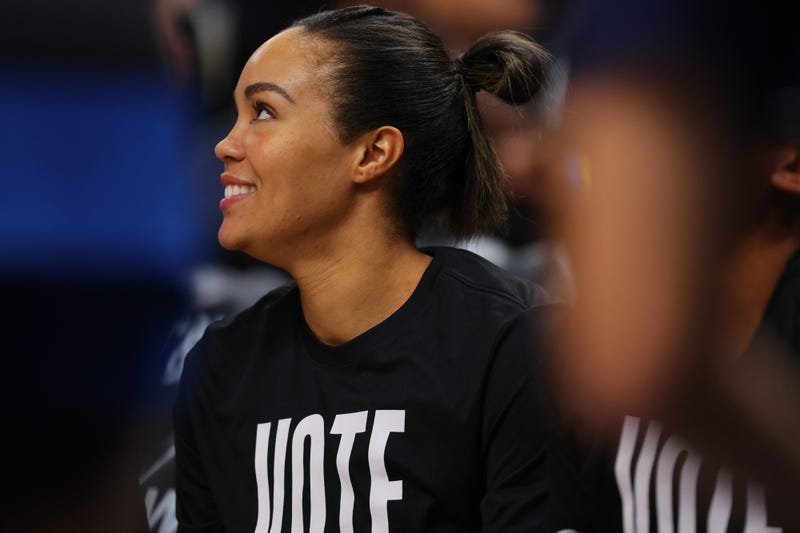 Forward Napheesa Collier #24 of the Minnesota Lynx is all smiles on the bench before the game for the Minnesota Lynx. Collier has been playing at an MVP level all year and has the Lynx at the top of the WNBA heading into the playoffs.