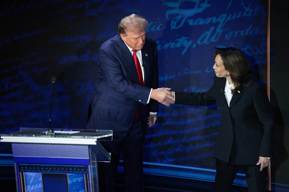 Republican presidential nominee, former U.S. President Donald Trump and Democratic presidential nominee, U.S. Vice President Kamala Harris greet as they debate for the first time during the presidential election campaign at The National Constitution Center on September 10, 2024 in Philadelphia, Pennsylvania.