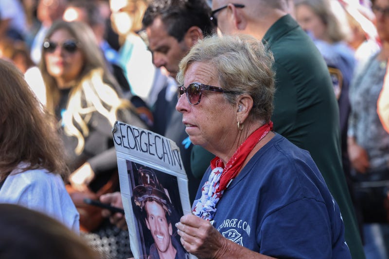 Family and friends of the victims attend the ceremony Wednesday