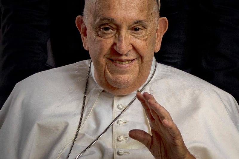 Pope Francis waves