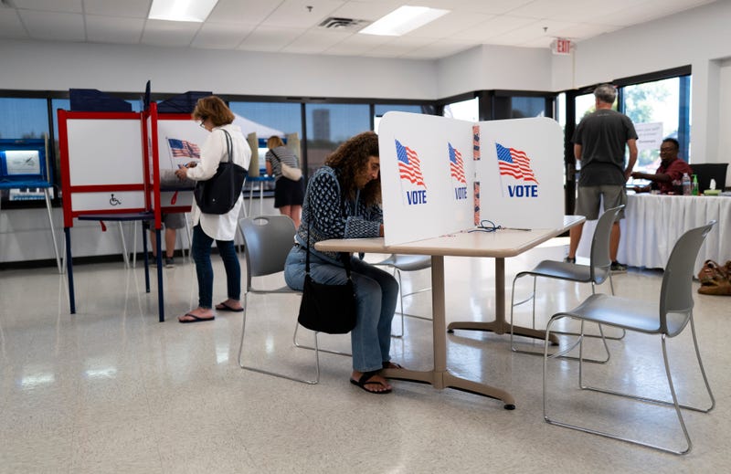 Voters fill out their ballots at the Minneapolis Elections & Voter Services building on September 20, 2024 in Minneapolis, Minnesota. 