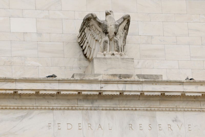 A statue of an eagle is seen on the Federal Reserve building on September 17, 2024 in Washington, DC.