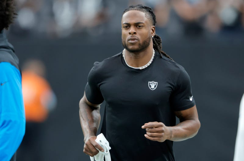 Davante Adams #17 of the Las Vegas Raiders warms up before a game between the Las Vegas Raiders and Carolina Panthers at Allegiant Stadium on September 22, 2024 in Las Vegas, Nevada
