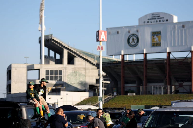 Fans tailgate before the Oakland Athletics play the Texas Rangers at the Oakland Coliseum on September 24, 2024 in Oakland, California.