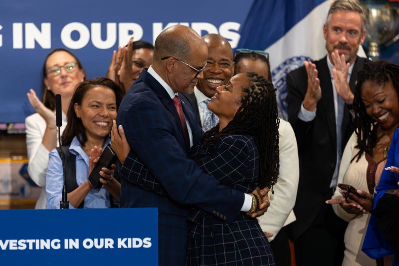 NYC Schools Chancellor David Banks embraces Sheena Wright during his announcement to retire on Sept. 25, 2024
