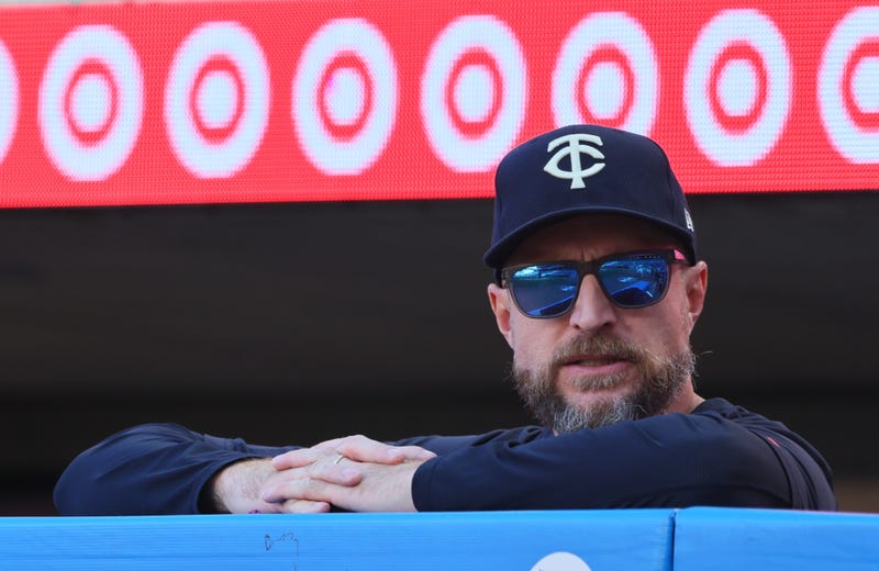 Rocco Baldelli #5 of the Minnesota Twins looks on from the dugout in the ninth inning against the Baltimore Orioles at Target Field on September 29, 2024 in Minneapolis, Minnesota. The Baltimore Orioles defeated the Minnesota Twins 6-2.