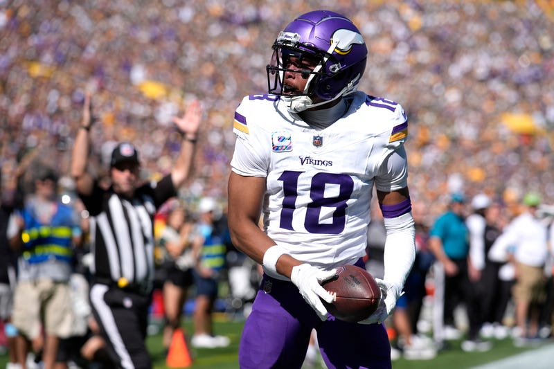 Justin Jefferson #18 of the Minnesota Vikings celebrates after scoring a touchdown against the Green Bay Packers during the second quarter of the game at Lambeau Field on September 29, 2024 in Green Bay, Wisconsin.