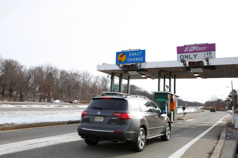 A car approaching the entrance to the Garden State Parkway in Paramus, New Jersey, is required to pass thru the E-ZPass toll booth.