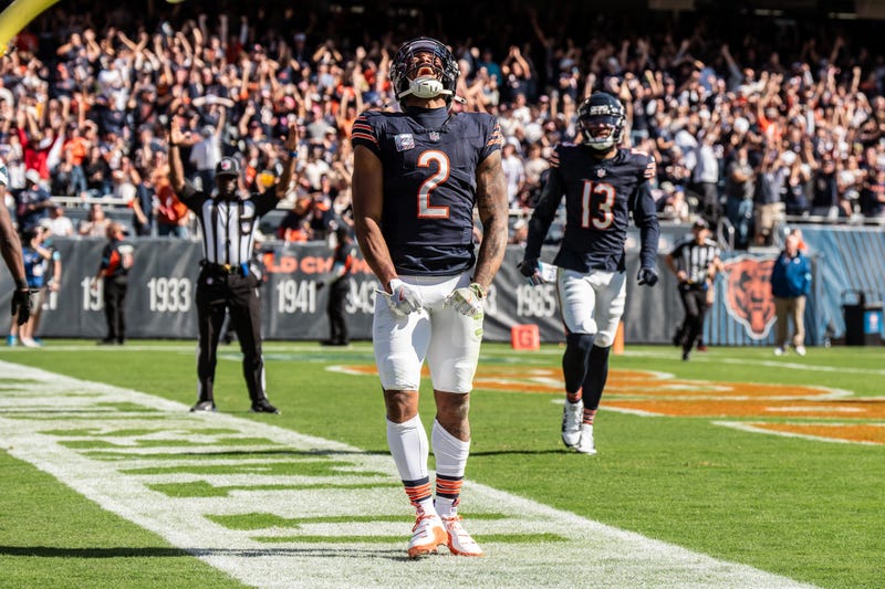 Chicago Bears wide receiver DJ Moore celebrates a touchdown reception during the second quarter of an NFL football game against the Carolina Panthers at Soldier Field on Oct. 6, 2024, in Chicago.