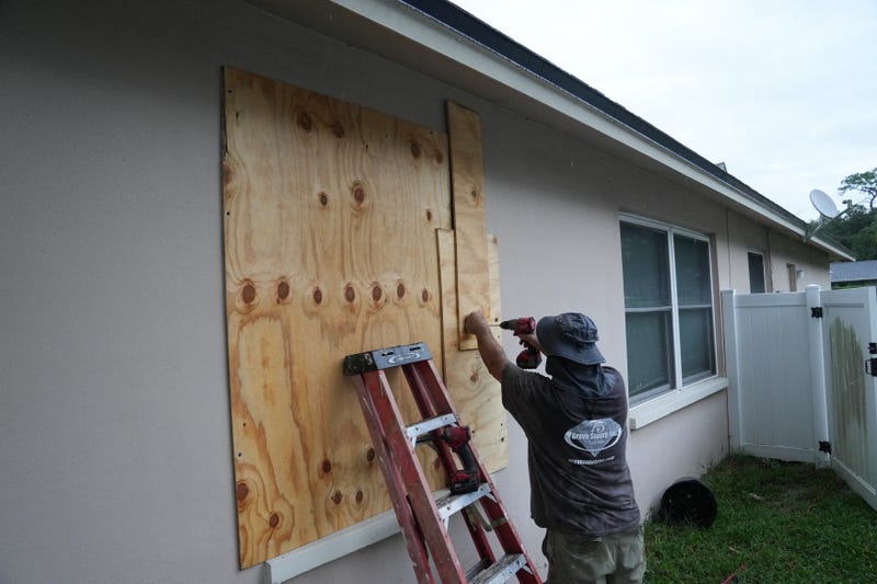 resident boards up his windows