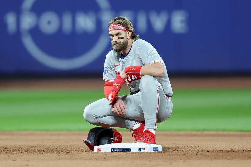 Bryce Harper looks on from second base in the sixth inning against the New York Mets during Game Four of the Division Series.