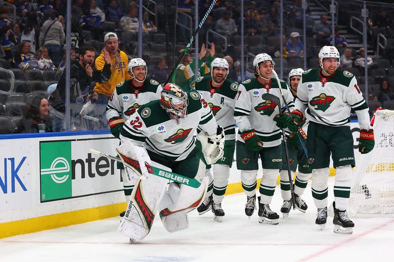 Goalie Filip Gustavsson #32 of the Minnesota Wild celebrates after scoring a goal against the St. Louis Blues in the third period at Enterprise Center on October 15, 2024 in St Louis, Missouri.