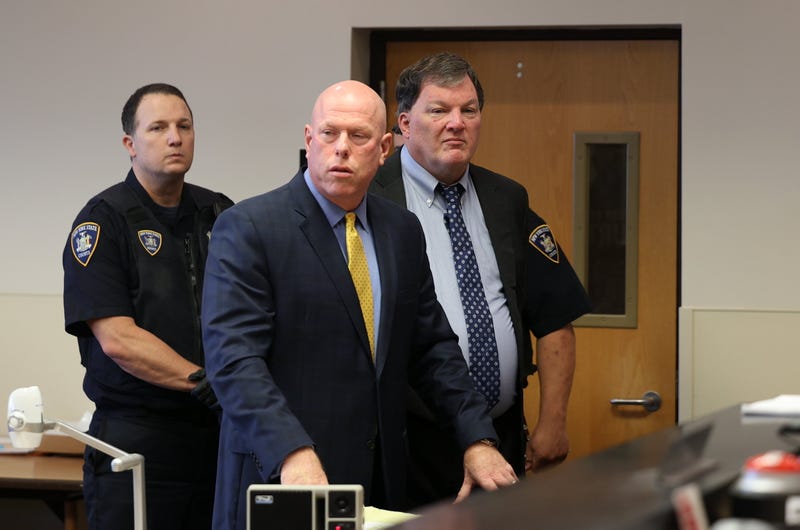Rex Heuermann and his attorney Michael Brown appear in court in Riverhead