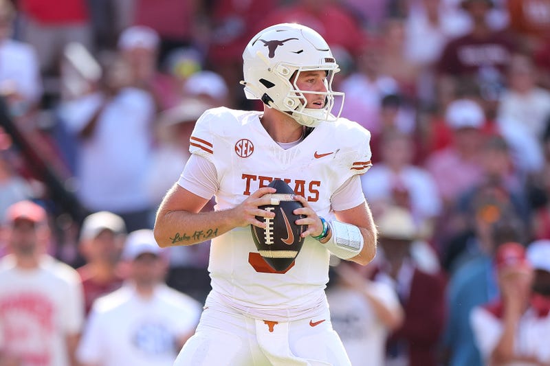 Quinn Ewers #3 of the Texas Longhorns looks to throw the ball during the second quarter against the Oklahoma Sooners at Cotton Bowl Stadium on Oct. 12, 2024, in Dallas, Texas.