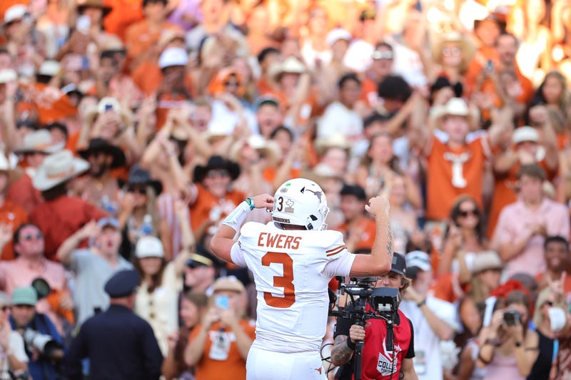 Quinn Ewers #3 of the Texas Longhorns reacts as fans cheer during the fourth quarter against the Oklahoma Sooners at Cotton Bowl Stadium on Oct. 12, 2024, in Dallas, Texas.