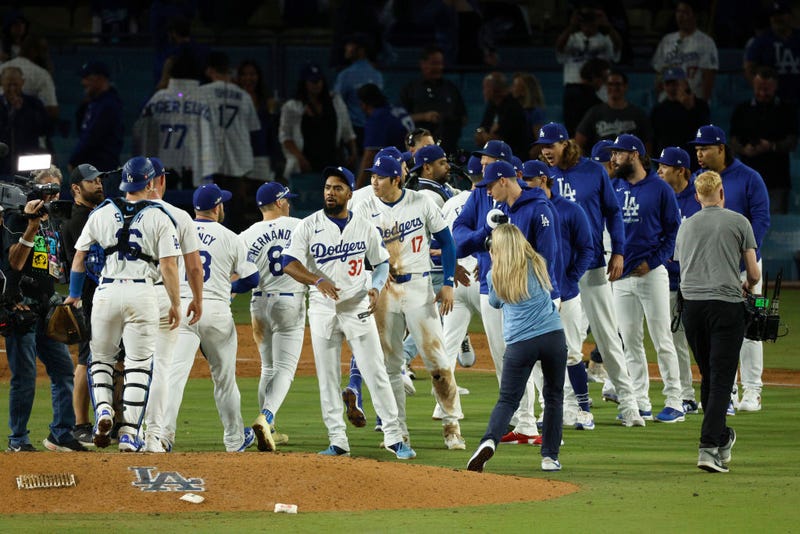 The Los Angeles Dodgers celebrate after beating the New York Mets 9-0 in Game One of the Championship Series at Dodger Stadium on October 13, 2024 in Los Angeles, California.