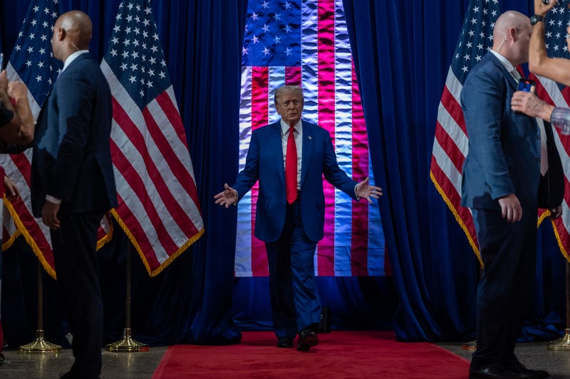 Former President Donald Trump walks onto the stage at his Town Hall in Oaks, Pennsylvania on Monday, October 14.