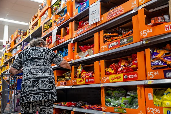 A customer shops for Halloween candy at a Walmart Supercenter on October 16, 2024 in Austin, Texas. Due in part to a shortage of cocoa beans, Halloween candy prices are on the rise this year as chocolate prices have climbed 7.5%. Candy companies have begun shifting to non-chocolate candies as chocolate makers deal with shrinking margins and a decrease in sales. (Photo by Brandon Bell/Getty Images)