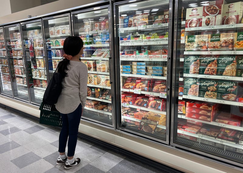 Woman in frozen food section