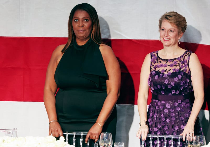 Attorney General of New York Letitia James (L) stands during the annual Alfred E. Smith Foundation Dinner at the New York Hilton Midtown on October 17, 2024