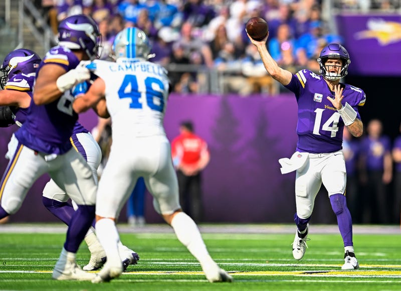 Sam Darnold #14 of the Minnesota Vikings throws a pass in the second quarter of a game against the Detroit Lions at U.S. Bank Stadium on October 20, 2024 in Minneapolis, Minnesota.