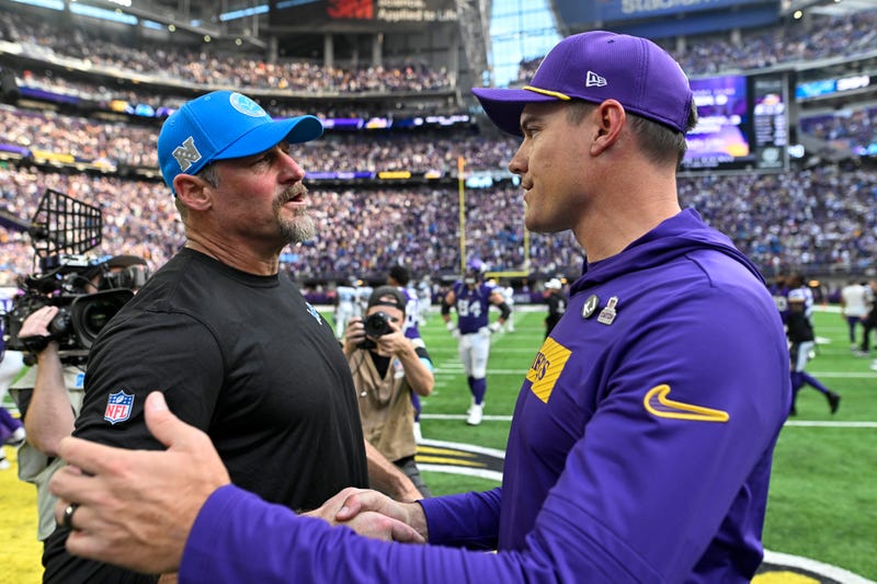 Head coach Kevin O'Connell of the Minnesota Vikings talks head coach Dan Campbell of the Detroit Lions after the Lions defeated the Vikings, 31-29, at U.S. Bank Stadium on October 20, 2024 in Minneapolis, Minnesota.