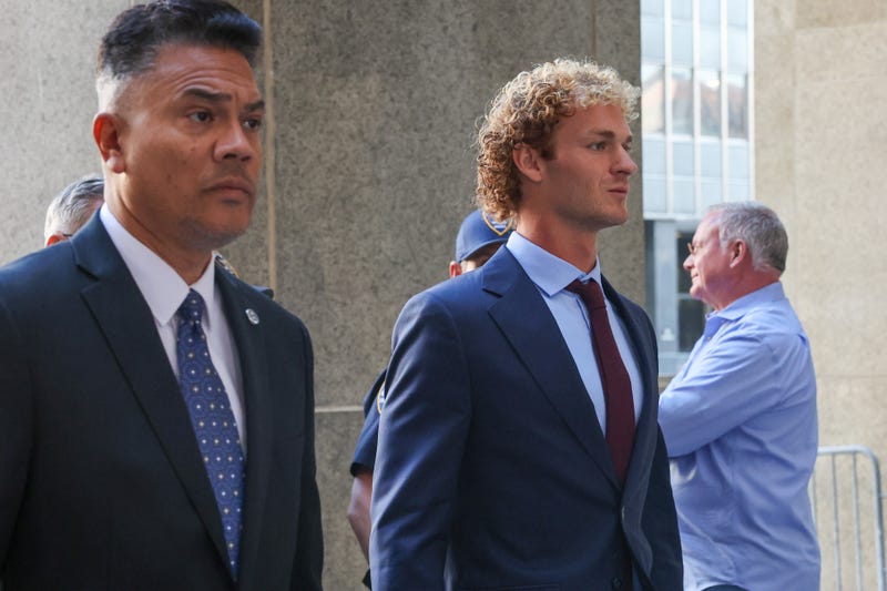 Daniel Penny (R), who is charged in the death of Jordan Neely, walks into Manhattan Criminal Court as jury selection begins in his trial on Oct. 21, 2024