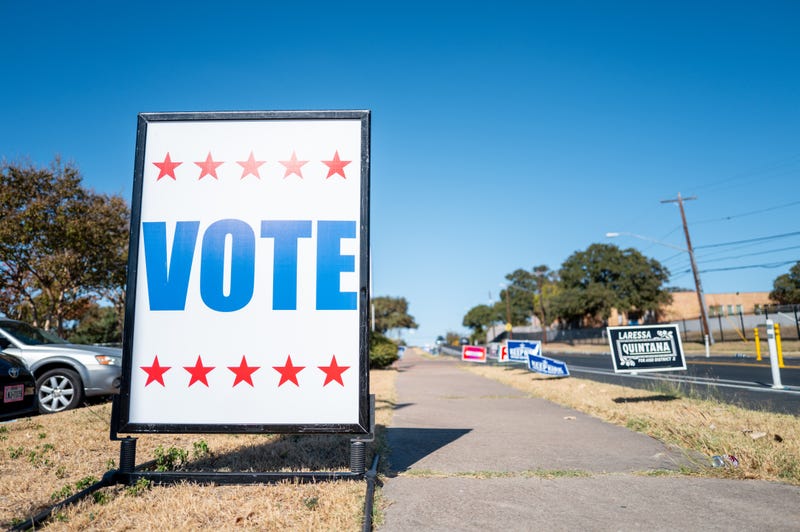 A voting sign is displayed near the entrance of the Millennium Youth Complex on Oct. 21, 2024, in Austin, Texas.