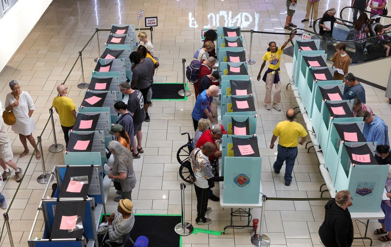 People vote at the Meadows Mall on October 21, 2024,in Las Vegas, Nevada.