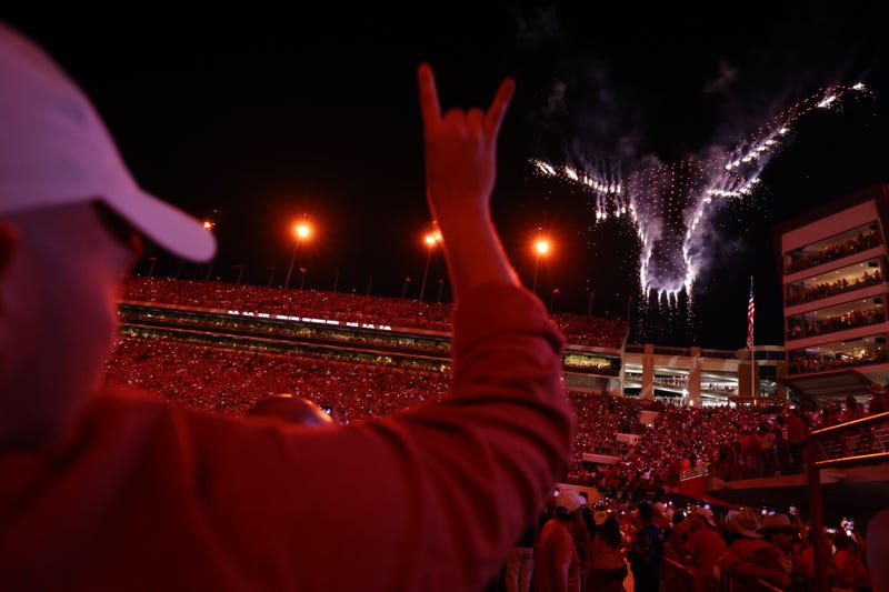 Texas Longhorns fans gesture during a light show against the Georgia Bulldogs during the second half at Darrell K Royal-Texas Memorial Stadium on Oct. 19, 2024, in Austin, Texas.