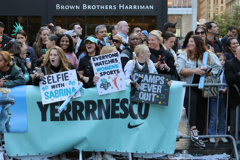 New York Liberty fans celebrate their WNBA championship during their parade on Broadway on October 24, 2024 in New York City