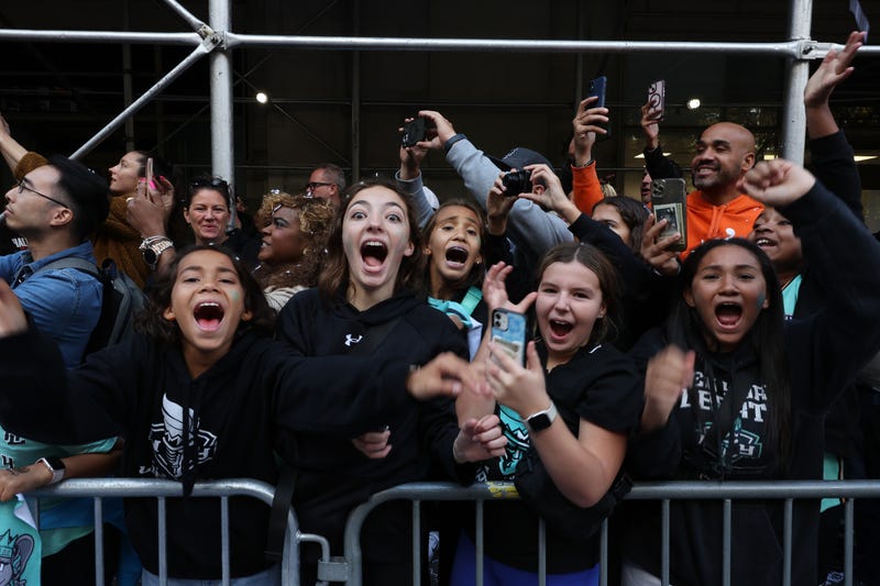 New York Liberty fans celebrate their WNBA championship during their parade on Broadway on October 24, 2024