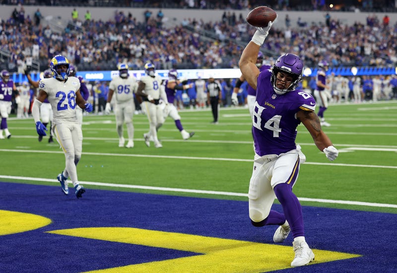Josh Oliver #84 of the Minnesota Vikings celebrates a touchdown pass reception against the Los Angeles Rams in the first quarter at SoFi Stadium on October 24, 2024 in Inglewood, California.