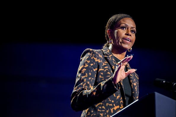 Former first lady Michelle Obama speaks ahead of the arrival of Democratic presidential nominee, U.S. Vice President Kamala Harris during a campaign rally at the Wings Event Center on October 26, 2024 in Kalamazoo, Michigan.