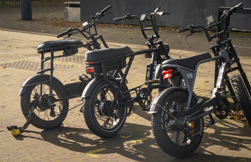 Fatbikes parked in the street, electric bicycles with large tires popular among teenagers