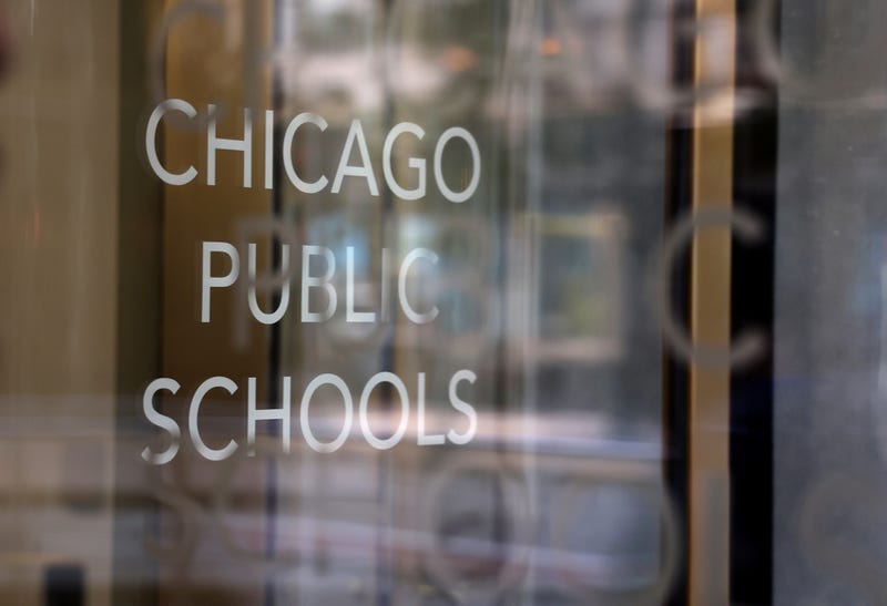 A sign is displayed on the front of the headquarters for Chicago Public Schools