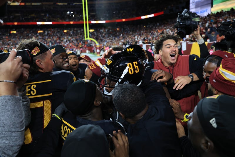 Noah Brown mobbed by teammates after win