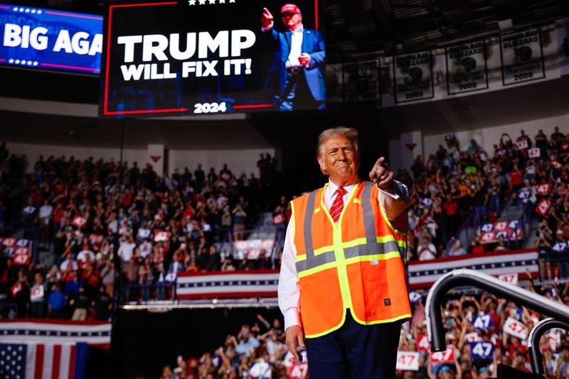 Republican presidential nominee, former President Donald Trump greets supporters during a campaign event at the Resch Center on October 30, 2024 in Green Bay, Wisconsin.