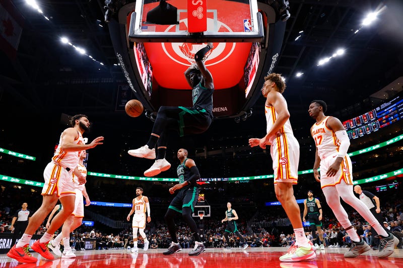 Neemias Queta #88 of the Boston Celtics dunks during the third quarter against the Atlanta Hawks at State Farm Arena on November 4, 2024 in Atlanta, Georgia.