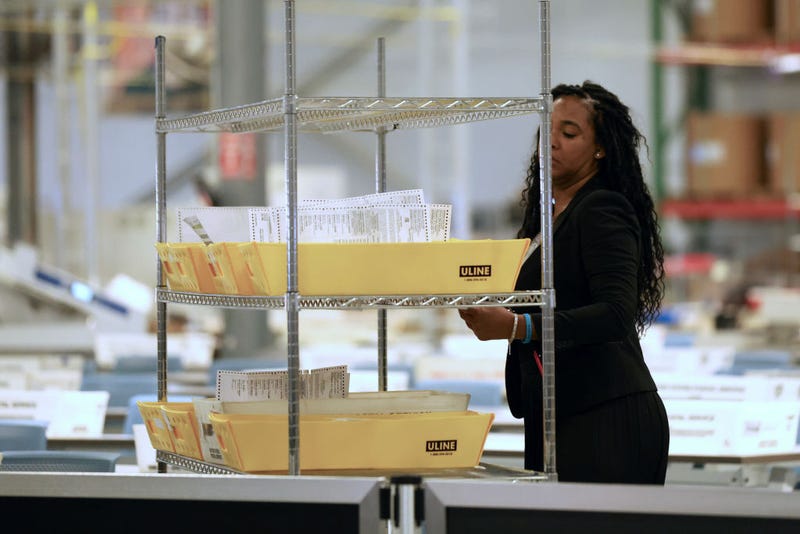 Woman counting ballots in Philadelphia