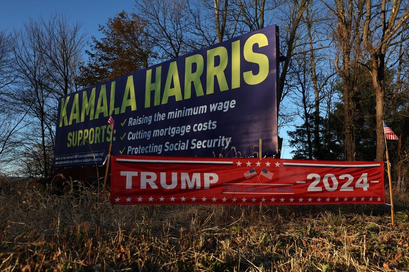 harris and trump campaign signs