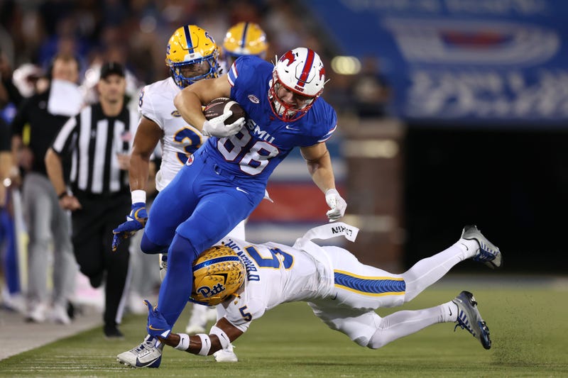 Matthew Hibner #88 of the Southern Methodist Mustangs is hit by Phillip O'Brien Jr. #5 of the Pittsburgh Panthers while running with the ball during the first half at Gerald J. Ford Stadium on Nov. 2, 2024, in Dallas, Texas.