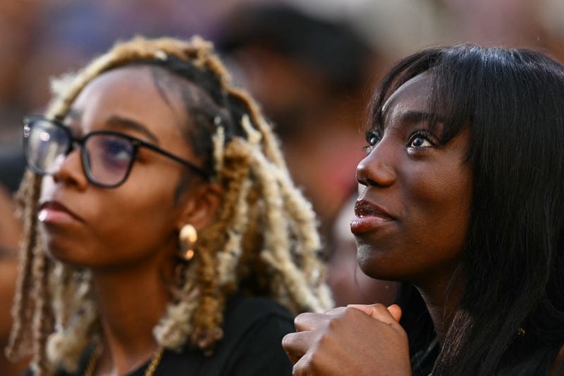 People react as U.S. Vice President Kamala Harris' concession speech at Howard University in Washington, D.C., on Nov. 6, 2024.