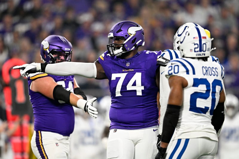 Cam Robinson #74 of the Minnesota Vikings reacts during the first quarter against the Indianapolis Colts at U.S. Bank Stadium on November 03, 2024 in Minneapolis, Minnesota.